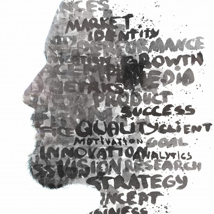 Double exposure.Paintography. Profile portrait of a young male combined with hand drawn painting of words such as market, growth, quality, strategy written in black ink